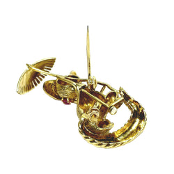 Broche en or champagne et rubis