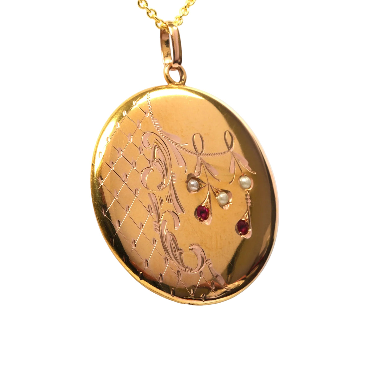 Pendentif en or jaune, perles et rubis