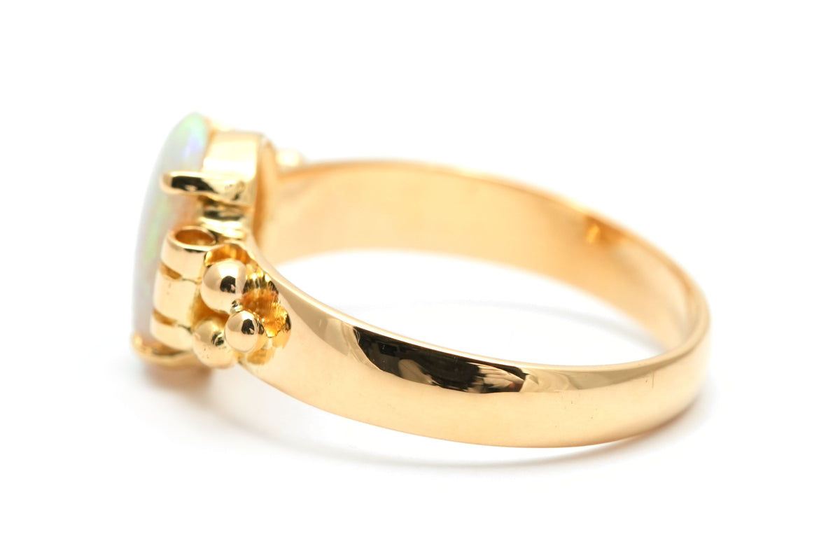 Bague Solitaire en or jaune et opale