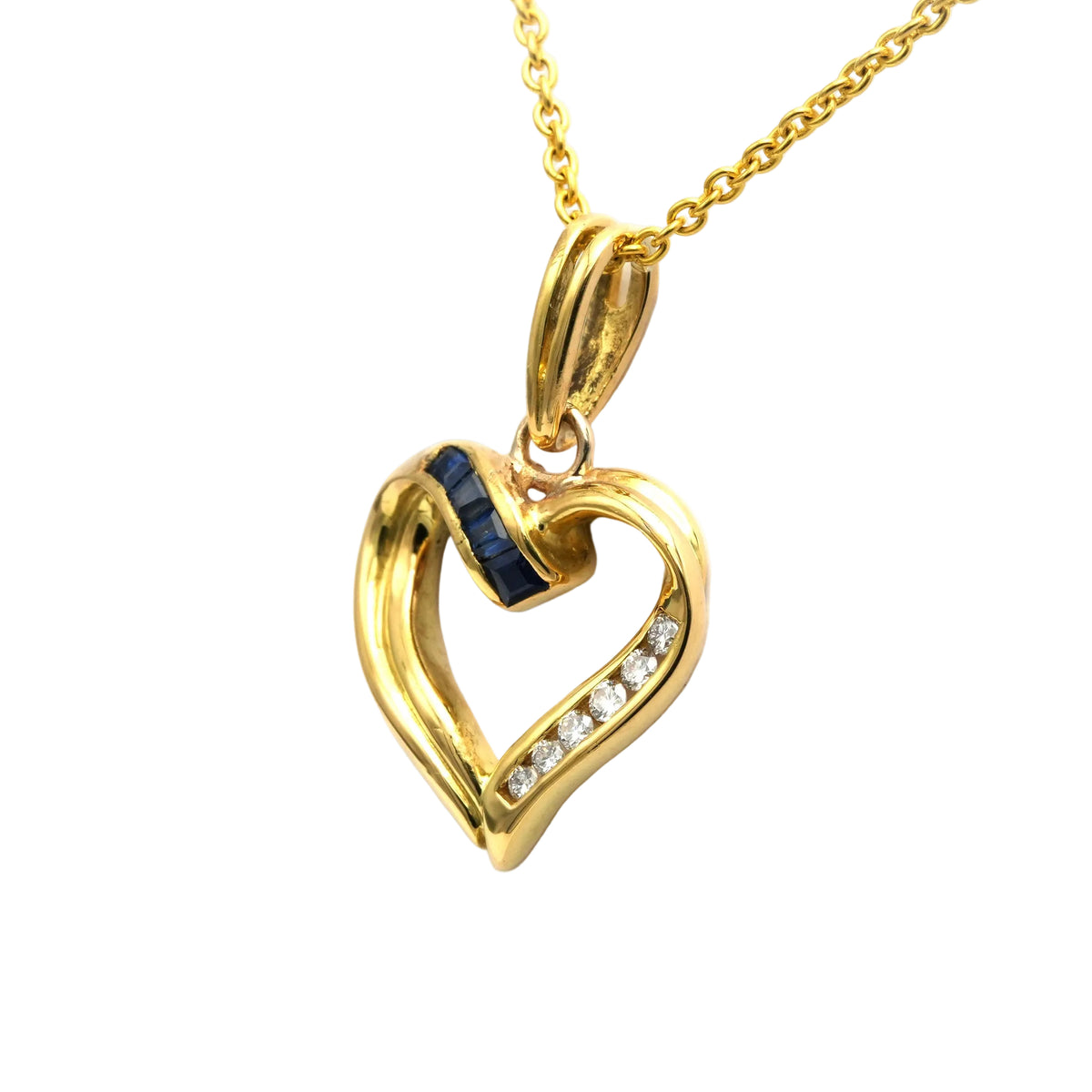 Pendentif en or jaune, saphirs et diamants