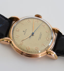 Montre ROLEX "Chronomètre" en or rose, acier et cuir