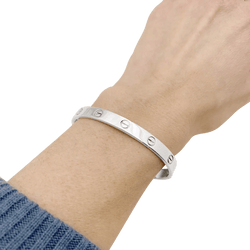 Bracelet Cartier "Love" or blanc.
