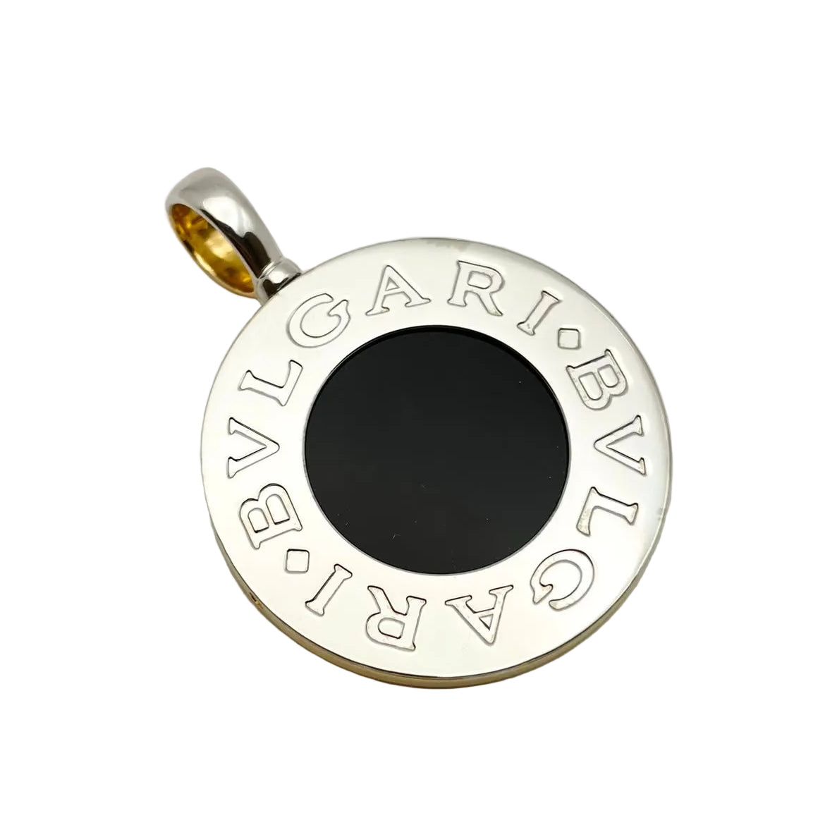 Pendentif BULGARI en or blanc, or jaune, nacre et onyx