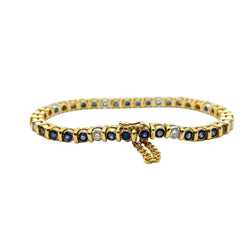Bracelet Ligne en or blanc, or jaune, saphirs et diamants