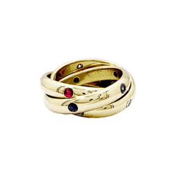Bague Cartier, "Constellation", or jaune, saphirs, rubis, diamants.