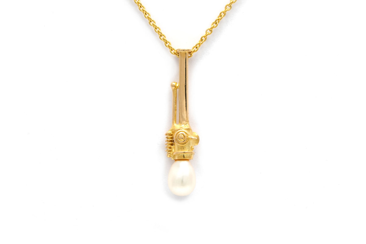 Pendentif en or jaune et perle