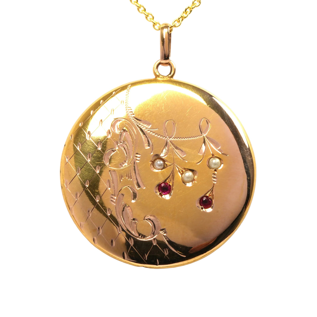 Pendentif en or jaune, perles et rubis