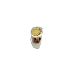 Bague Chevalière HERMÈS "Clou de selle" en argent et or jaune