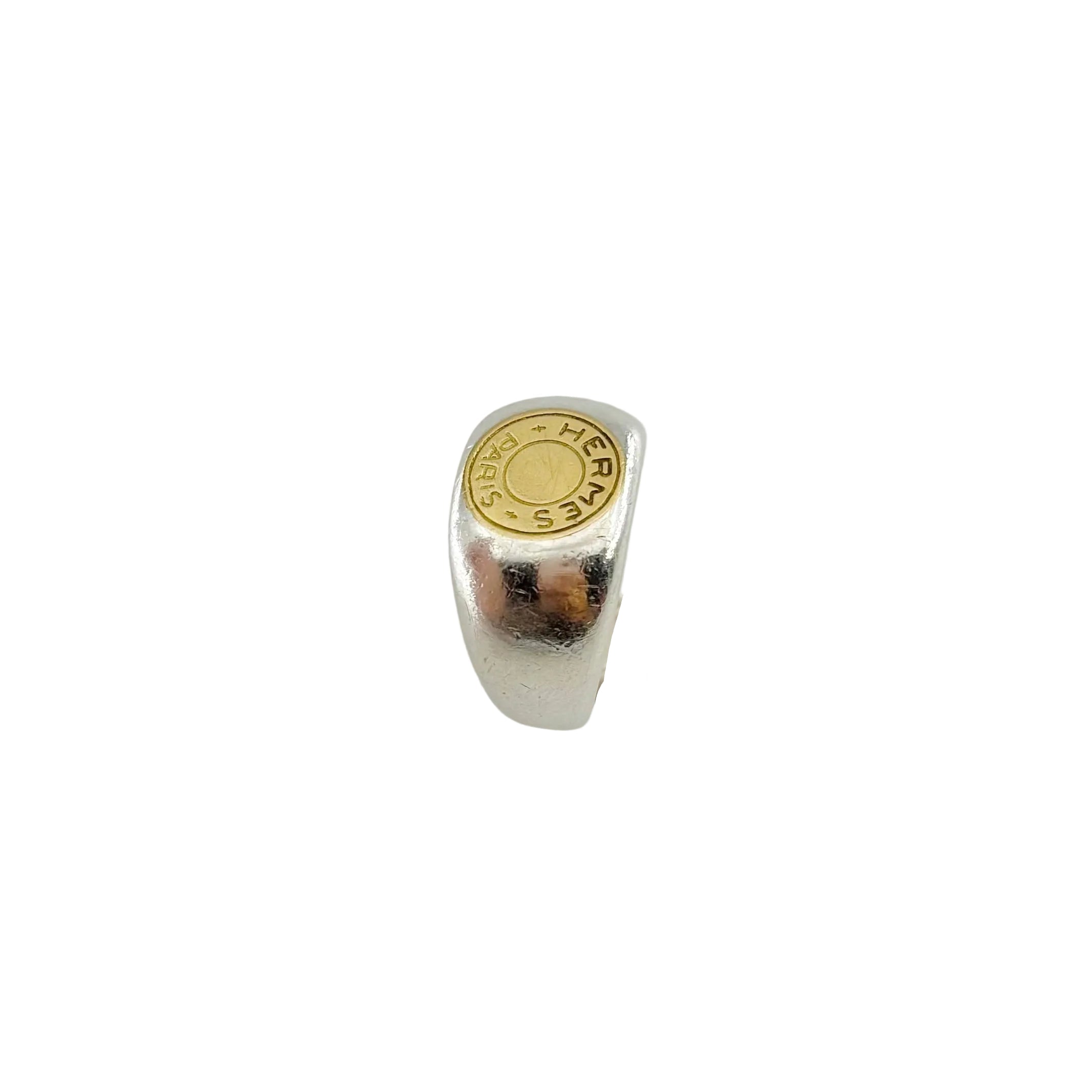 Bague Chevalière HERMÈS "Clou de selle" en argent et or jaune