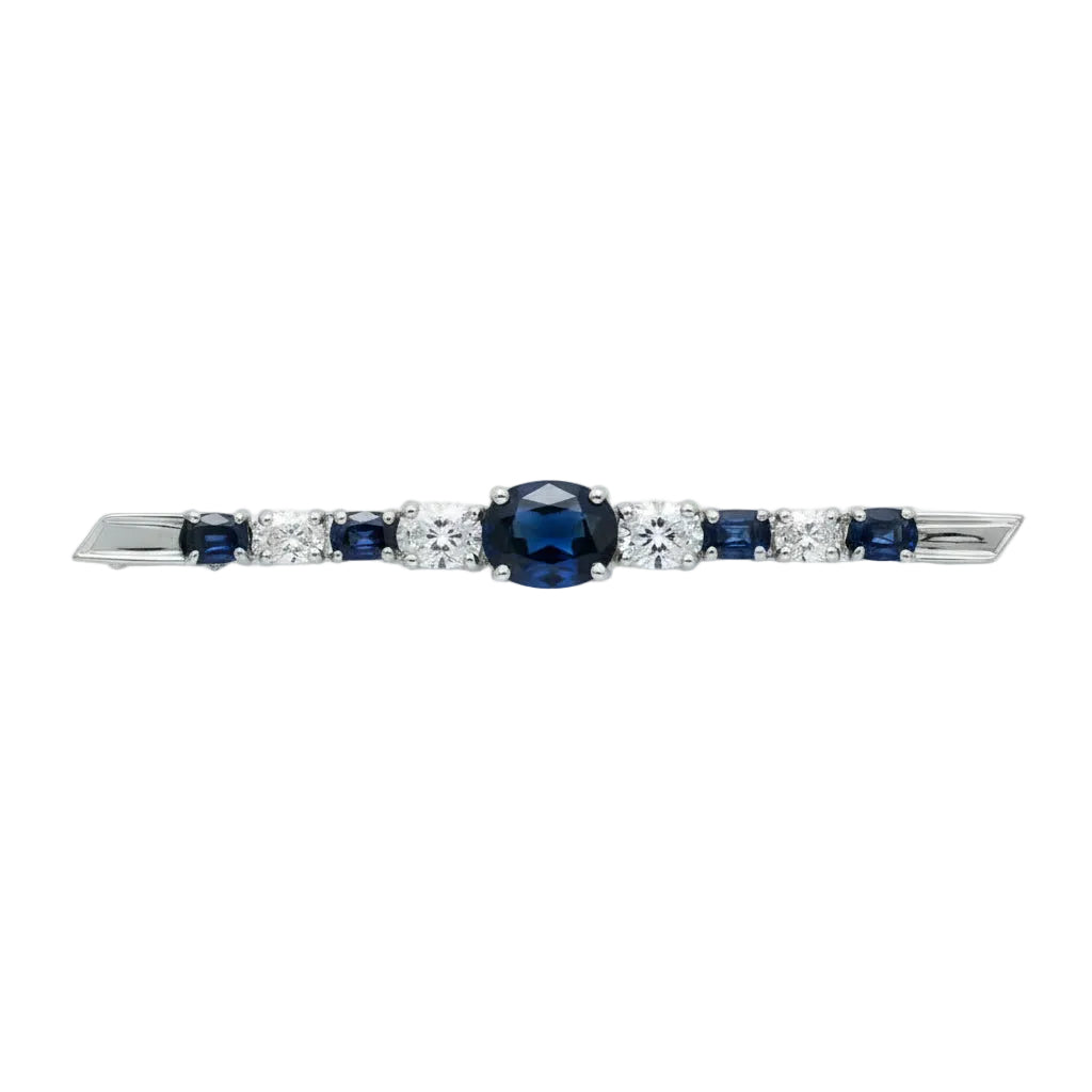 Broche Épingle en or blanc, saphirs et diamants