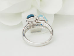 Bague Trilogie en or blanc, aigue-marine, topazes et diamants