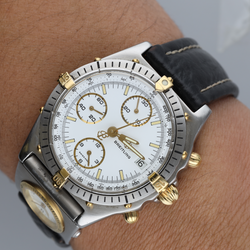 Montre BREITLING Chronomat en or jaune, acier et cuir