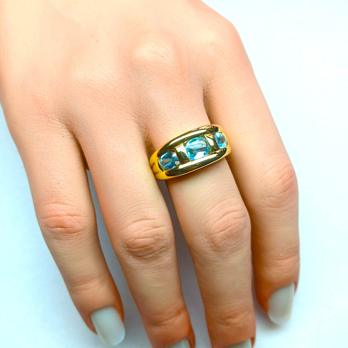 Bague Trilogie en or jaune et topazes