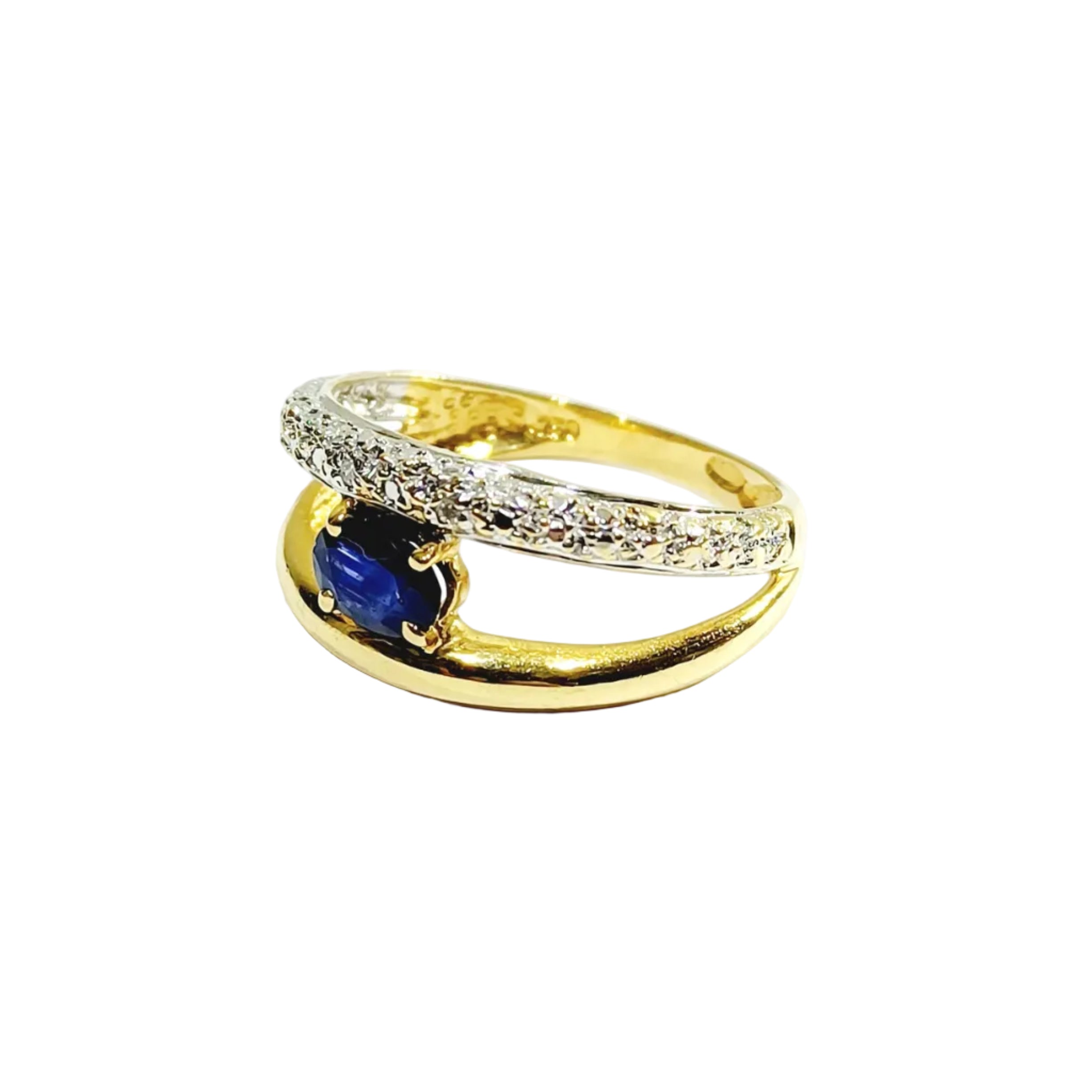 Ring in yellow gold, white gold, sapphire, and diamonds