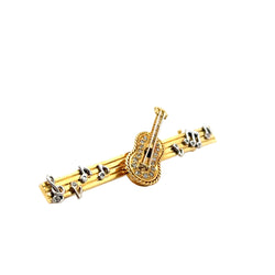 Broche en or jaune, or blanc et diamants