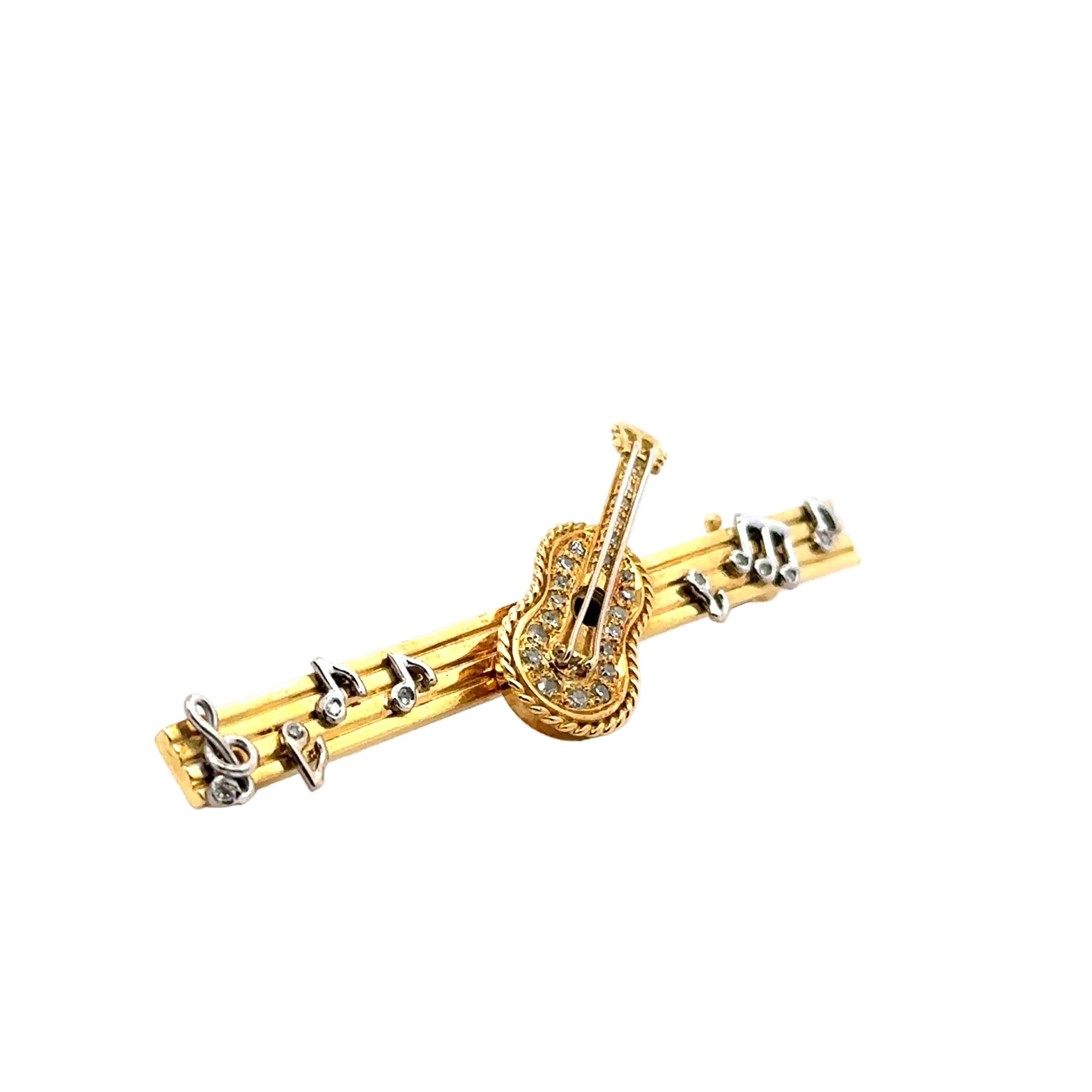 Broche en or jaune, or blanc et diamants