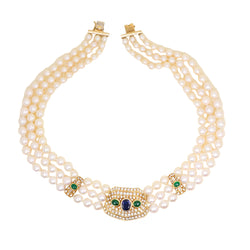 Parure REPOSSI en or jaune, perles, saphirs, émeraudes et diamants