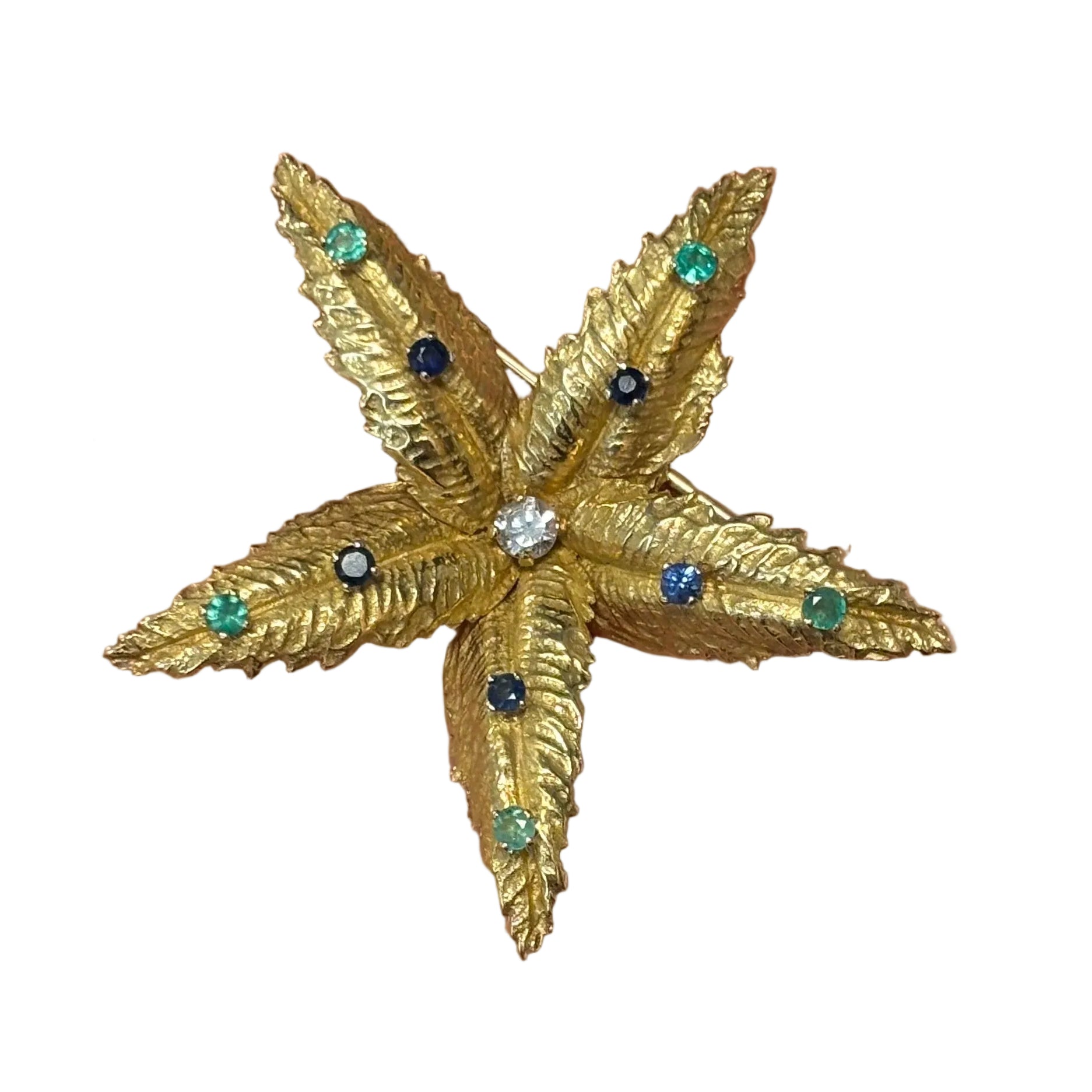 Broche BOUCHERON en or jaune, émeraudes, saphirs et diamant