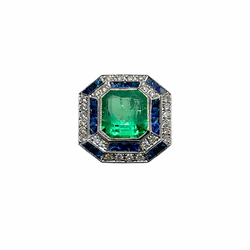 Bague Cocktail en or blanc, émeraude, saphirs et diamants