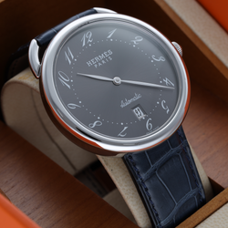Montre HERMÈS "Arceau" en acier et cuir