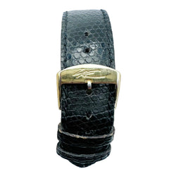 Montre BAUME & MERCIER en or jaune et cuir