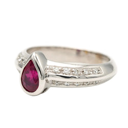 Bague Solitaire en or blanc, rubis et diamants