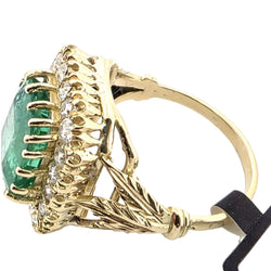Bague Entourage en or jaune, émeraude et diamants