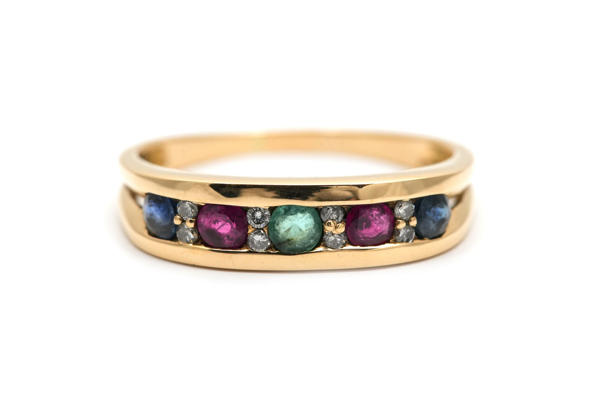 Bague en or jaune, émeraude, rubis, saphirs et diamants