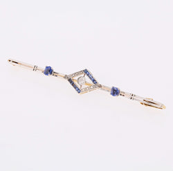 Broche Barrette en or jaune, platine, saphirs et diamants