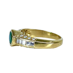 Bague Jonc en or jaune, émeraude et diamants