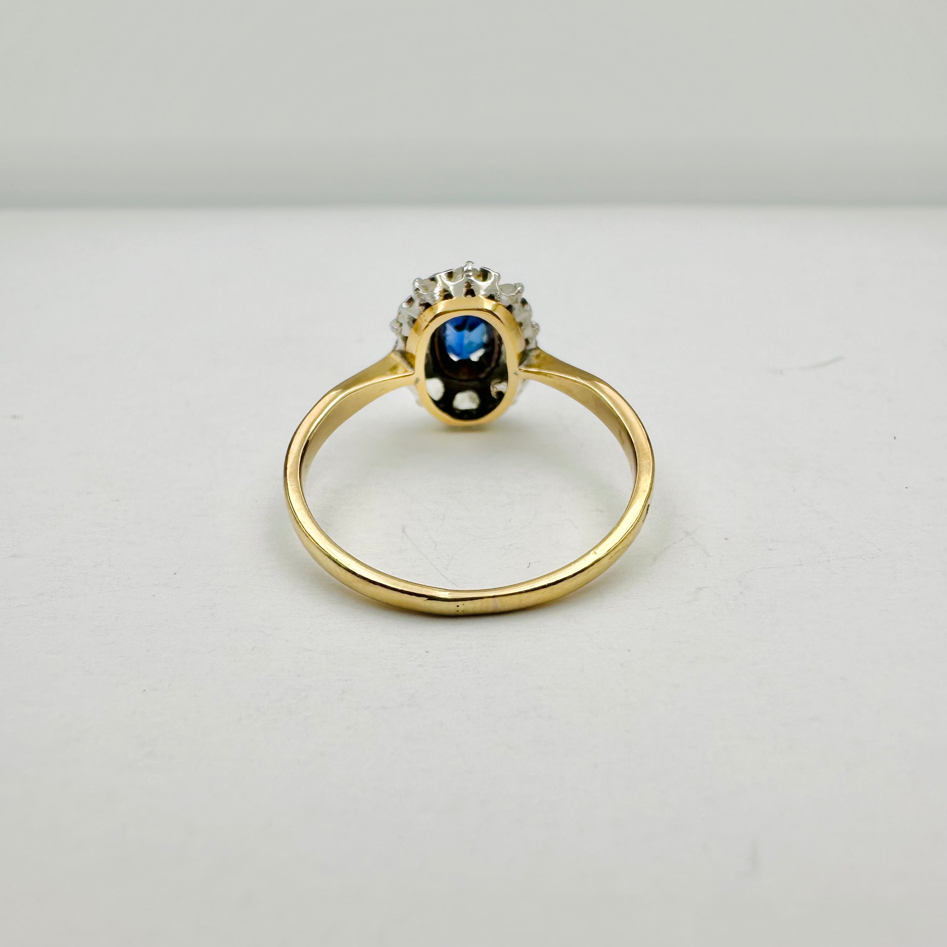 Bague Marguerite en or jaune, or blanc, saphir et diamants