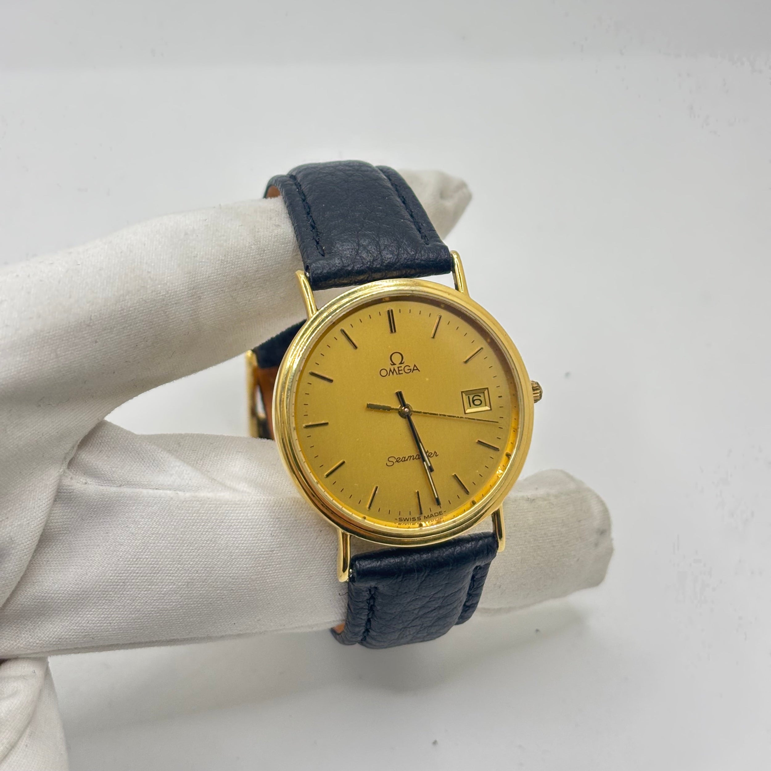 Montre OMEGA "Seamaster" en or jaune et cuir