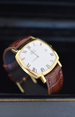 Montre PIAGET Coussin automatique en or jaune
