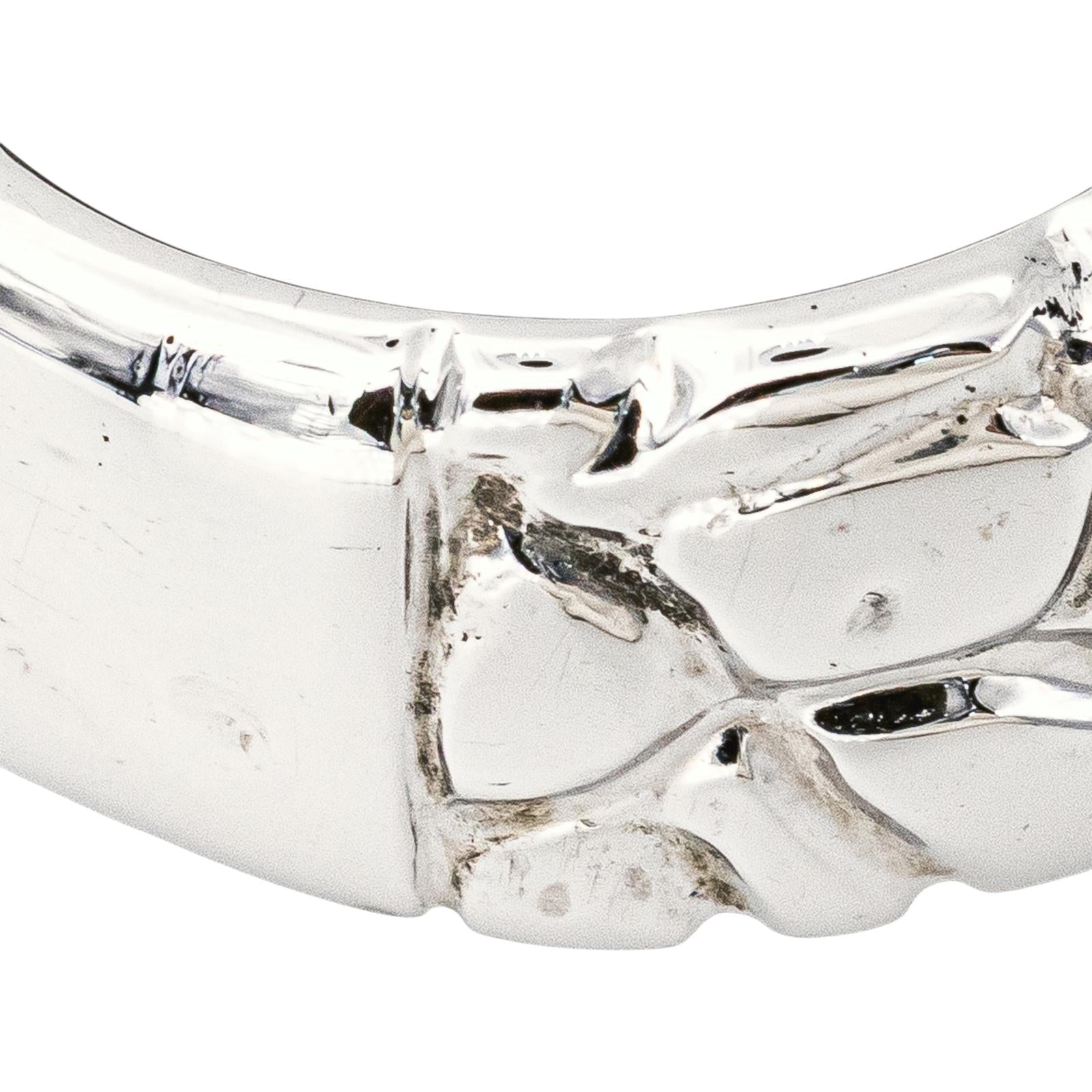Bague Bandeau en or blanc et rubis