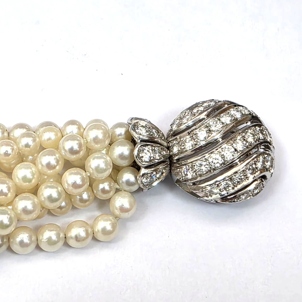 Bracelet en or blanc, perles et diamants