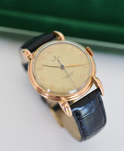 Montre ROLEX "Chronomètre" en or rose, acier et cuir