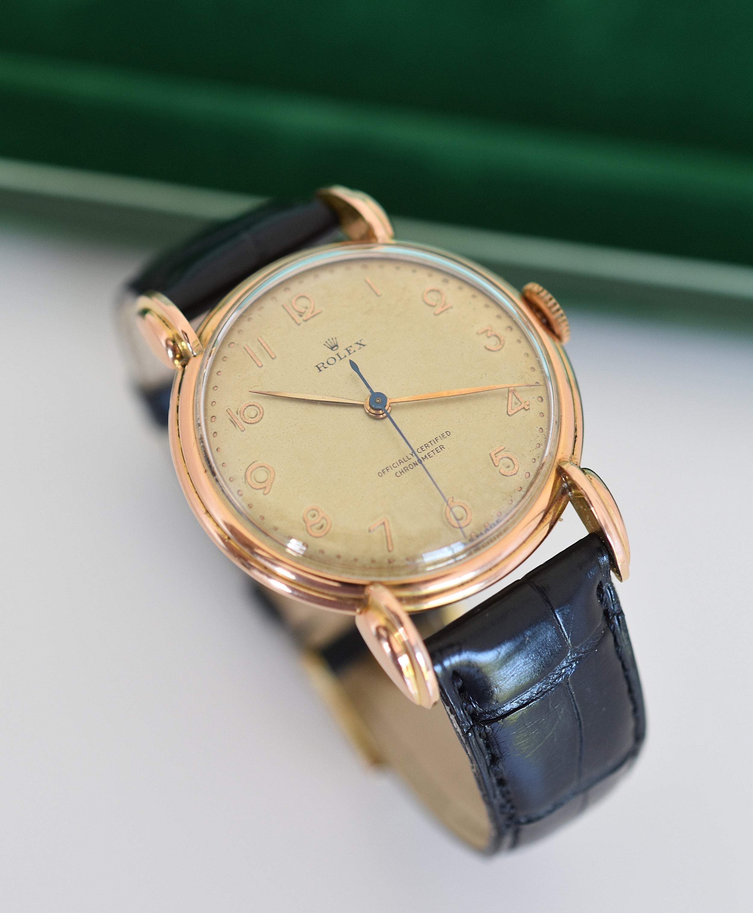 Montre ROLEX "Chronomètre" en or rose, acier et cuir