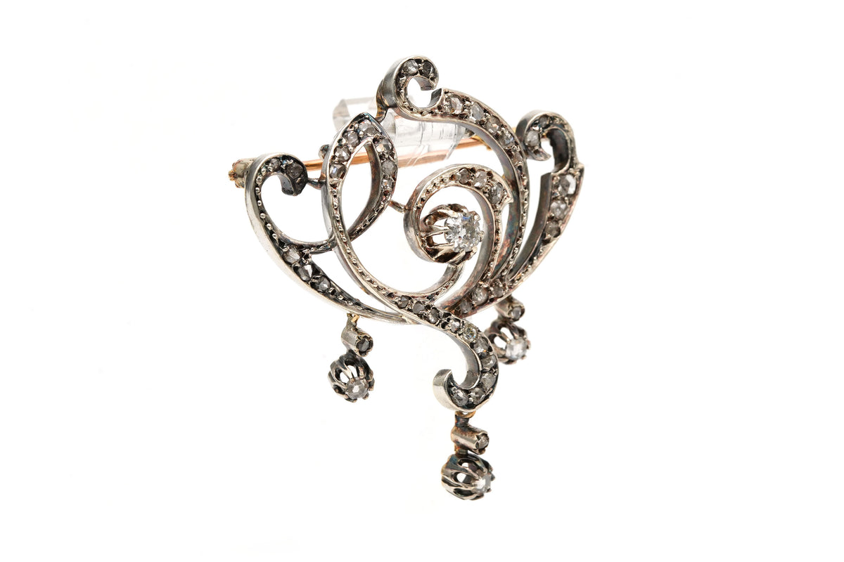 Broche Épingle en or jaune, argent et diamants