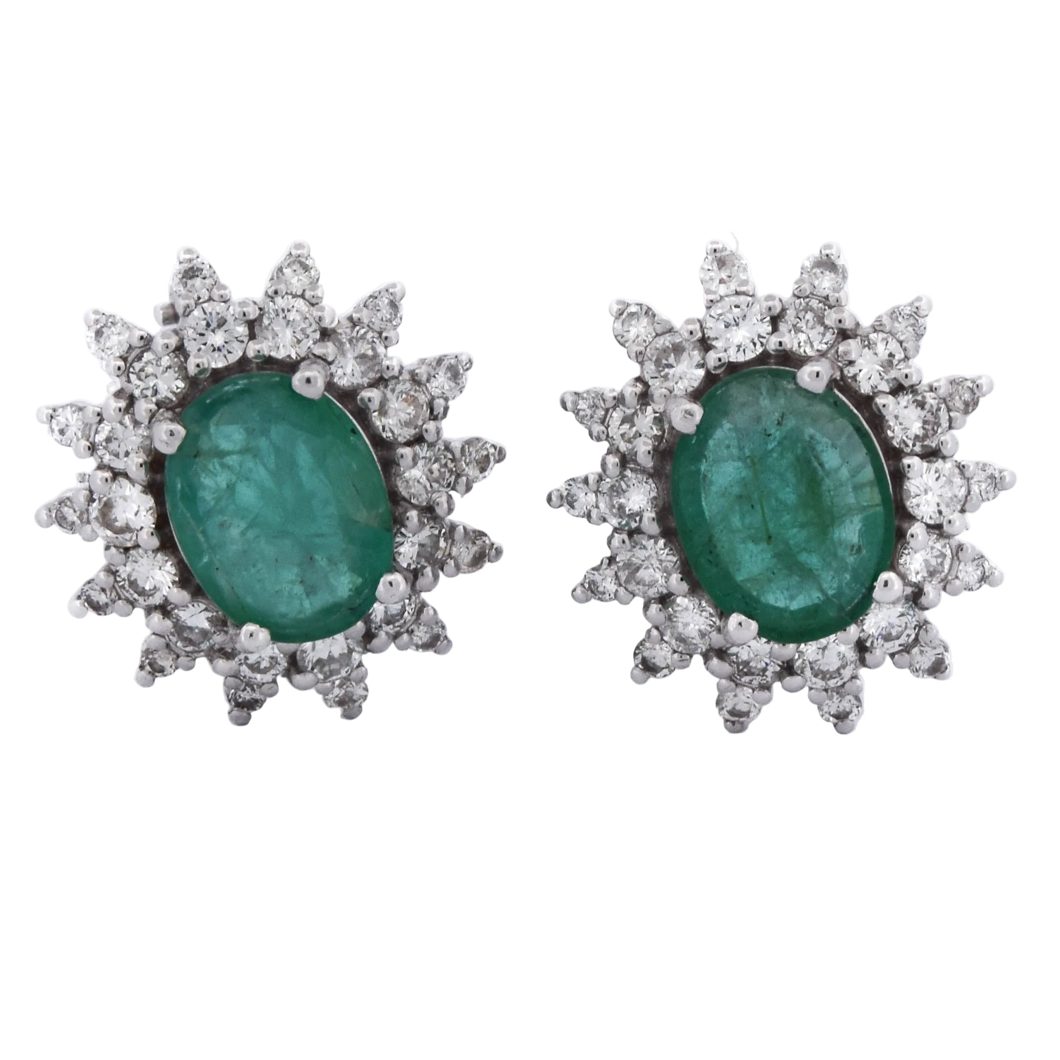 Boucles d'oreilles Clips en or blanc, émeraudes et diamants