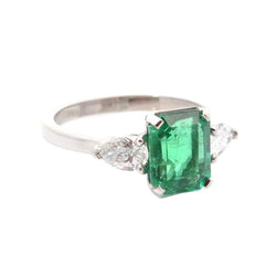 Bague Trilogie en platine, émeraude et diamants