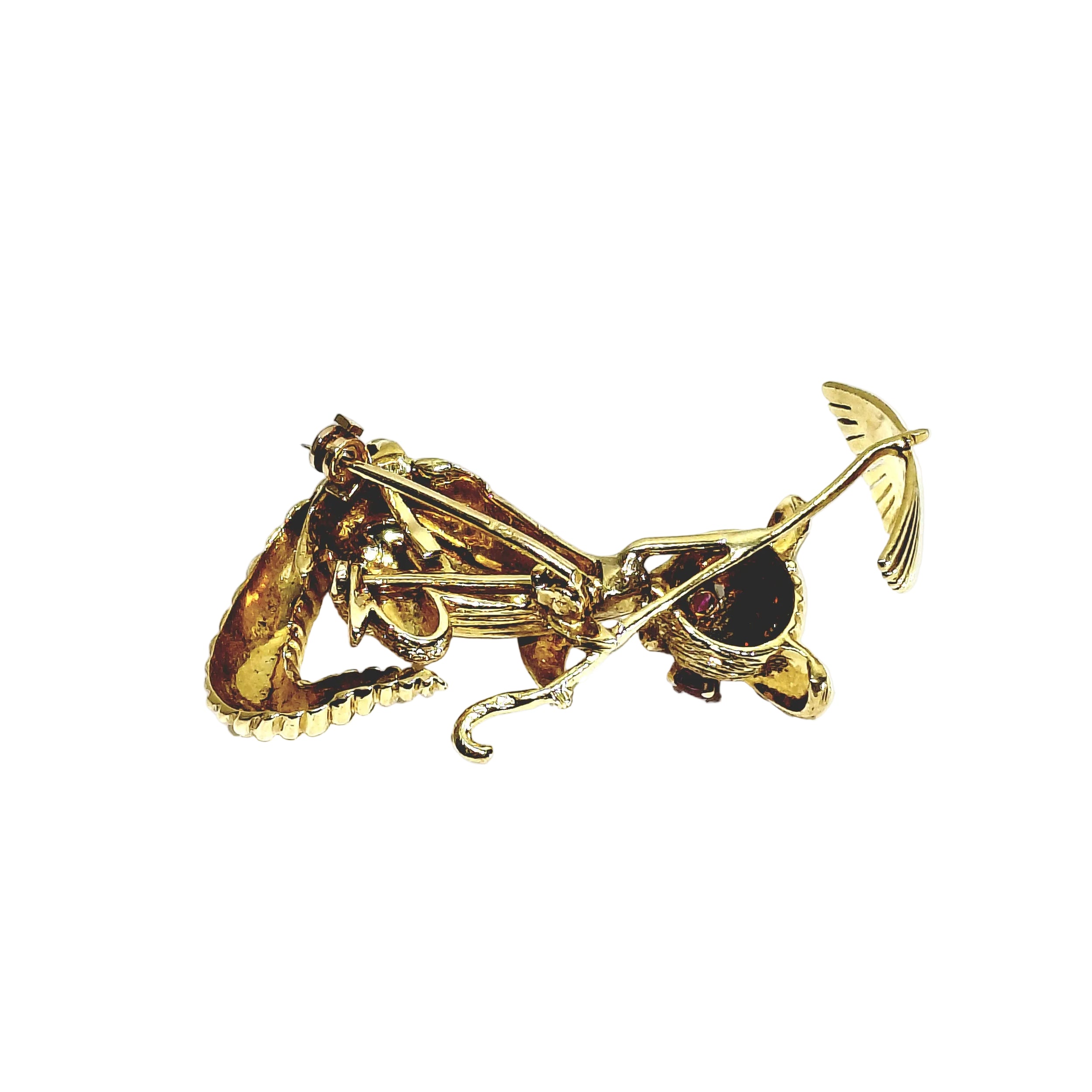 Broche en or champagne et rubis
