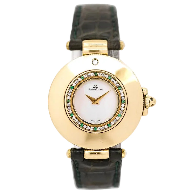 Montre JAEGER-LECOULTRE en or jaune, nacre, cuir, émeraudes et diamants