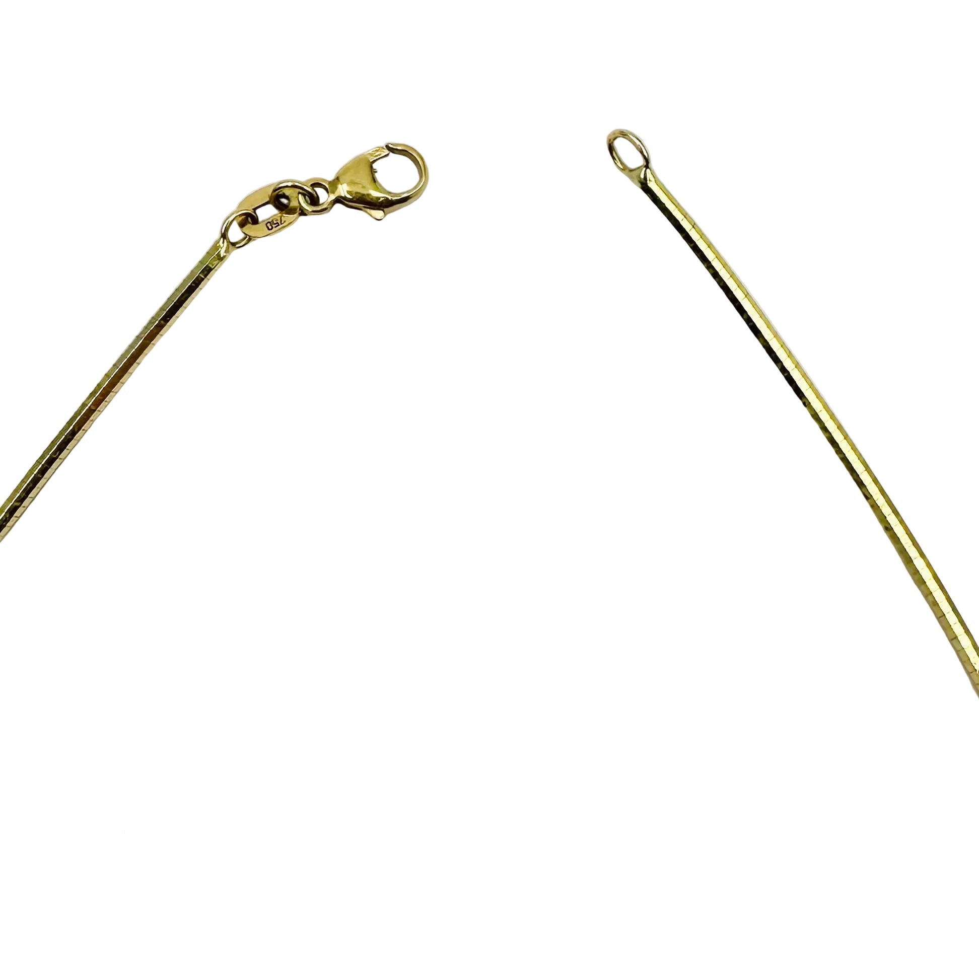 Pendentif en or jaune et émeraude