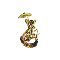 Broche en or champagne et rubis