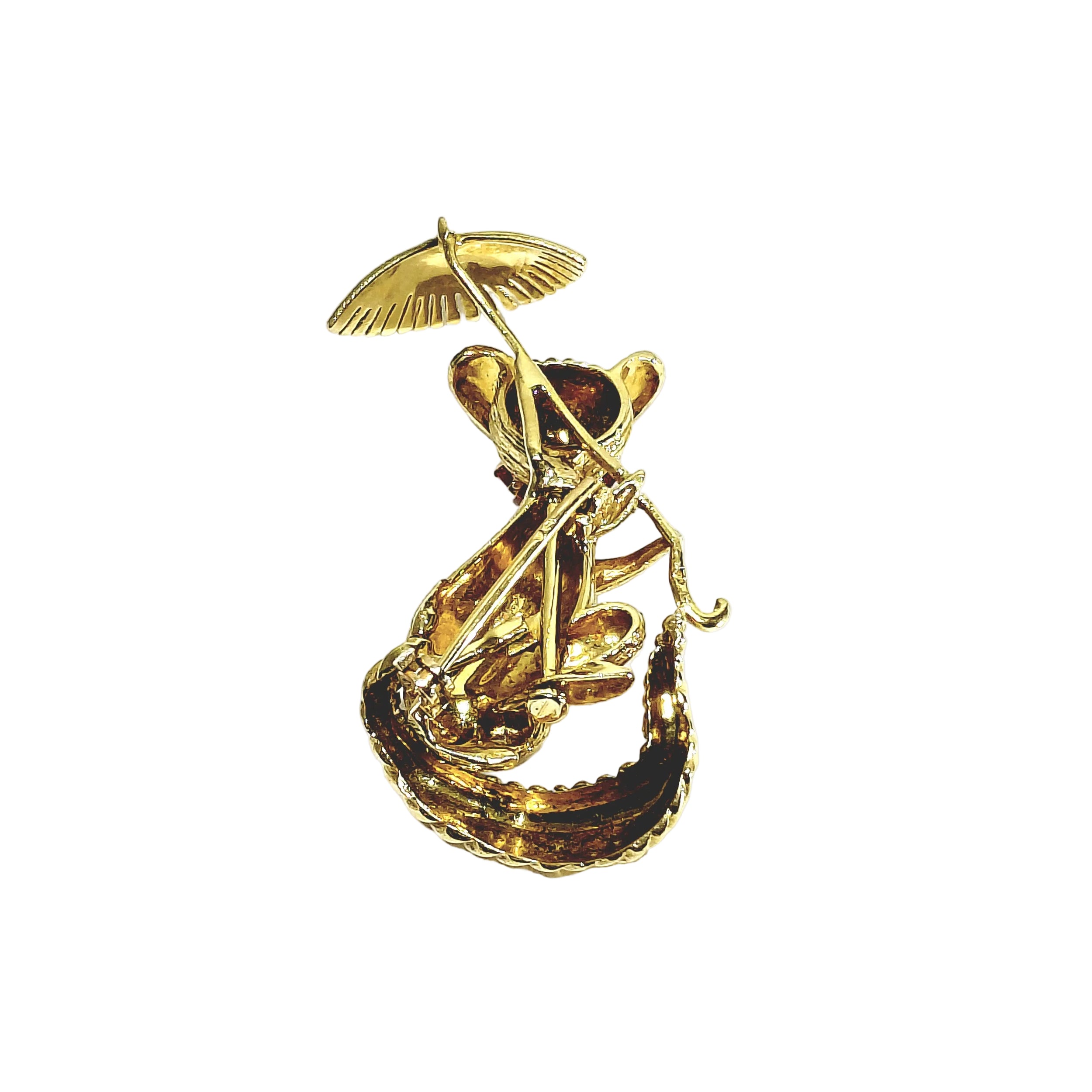 Broche en or champagne et rubis