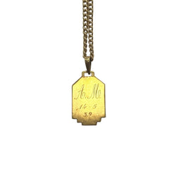 Médaille en or jaune et nacre