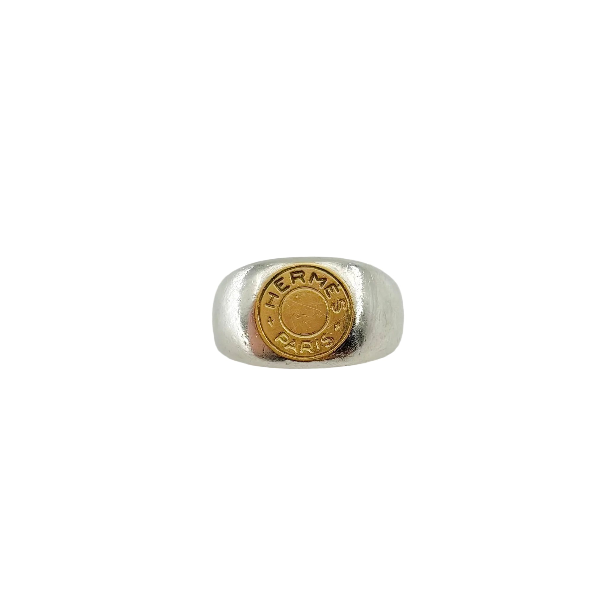 Bague Chevalière HERMÈS "Clou de selle" en argent et or jaune