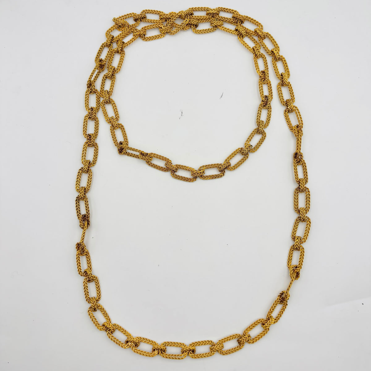 Sautoir en or jaune, maillons torsadés