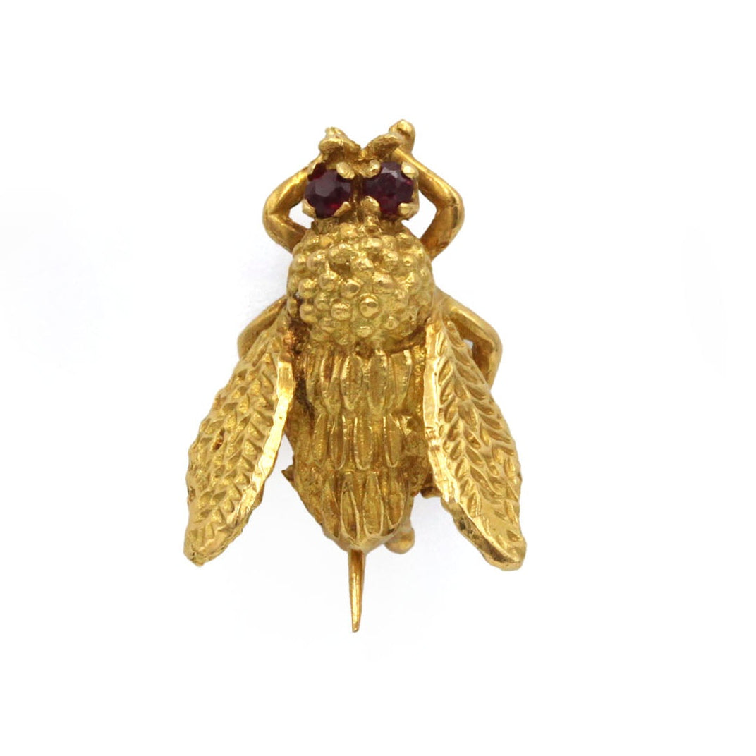 Broche Épingle en or jaune et rubis