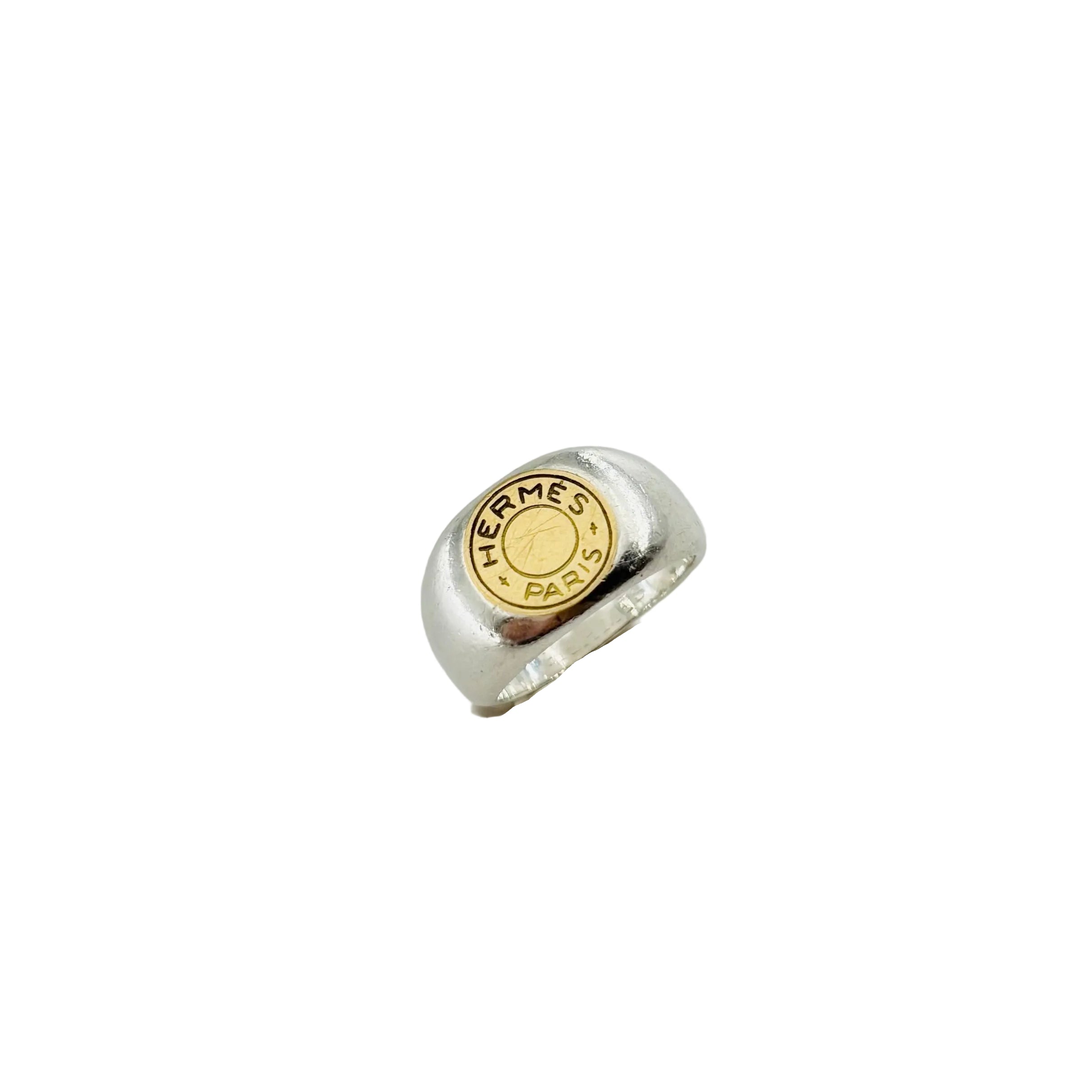Bague Chevalière HERMÈS "Clou de selle" en argent et or jaune